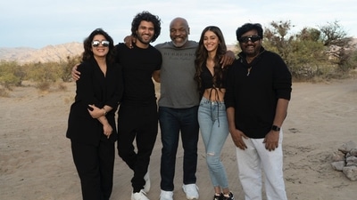 Charmy Kaurm, Vijay Deverakonda, Mike Tyson, Ananya Pandey and Puri Jagannadh poses while shooting for the upcoming film Liger. (Instagram)