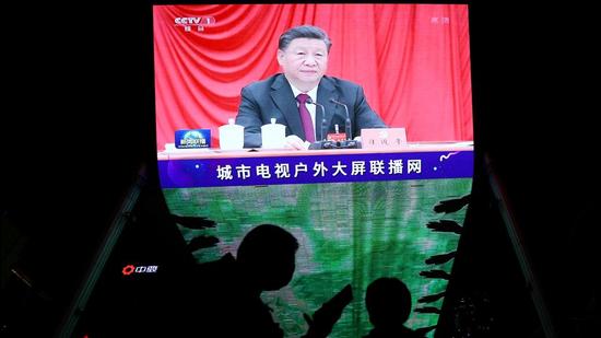 A screen shows Chinese President Xi Jinping attending the sixth plenary session of the 19th Central Committee of the Communist Party of China, in Beijing, on November 11, 2021. (REUTERS) A screen shows Chinese President Xi Jinping attending the sixth plenary session of the 19th Central Committee of the Communist Party of China, in Beijing, on November 11, 2021. (REUTERS)