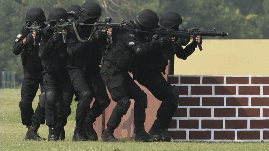 NSG commandos re-enact counterterrorism operations during a function in Gurugram, India on October 16. India and France have sought concerted action against terrorist groups such as LeT, JeM and al-Qaeda. (Parveen Kumar/Hindustan Times/ File)