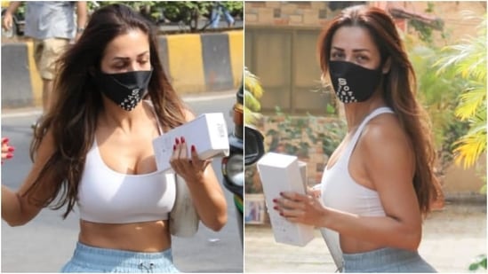Actor Malaika Arora was clicked outside her gym today in Mumbai. The star is a known fitness enthusiast who is also famous for her impeccable taste in workout fashion. Her wardrobe is full of standout athleisure pieces that prove you can look glam while working out.(HT Photo/Varinder Chawla)