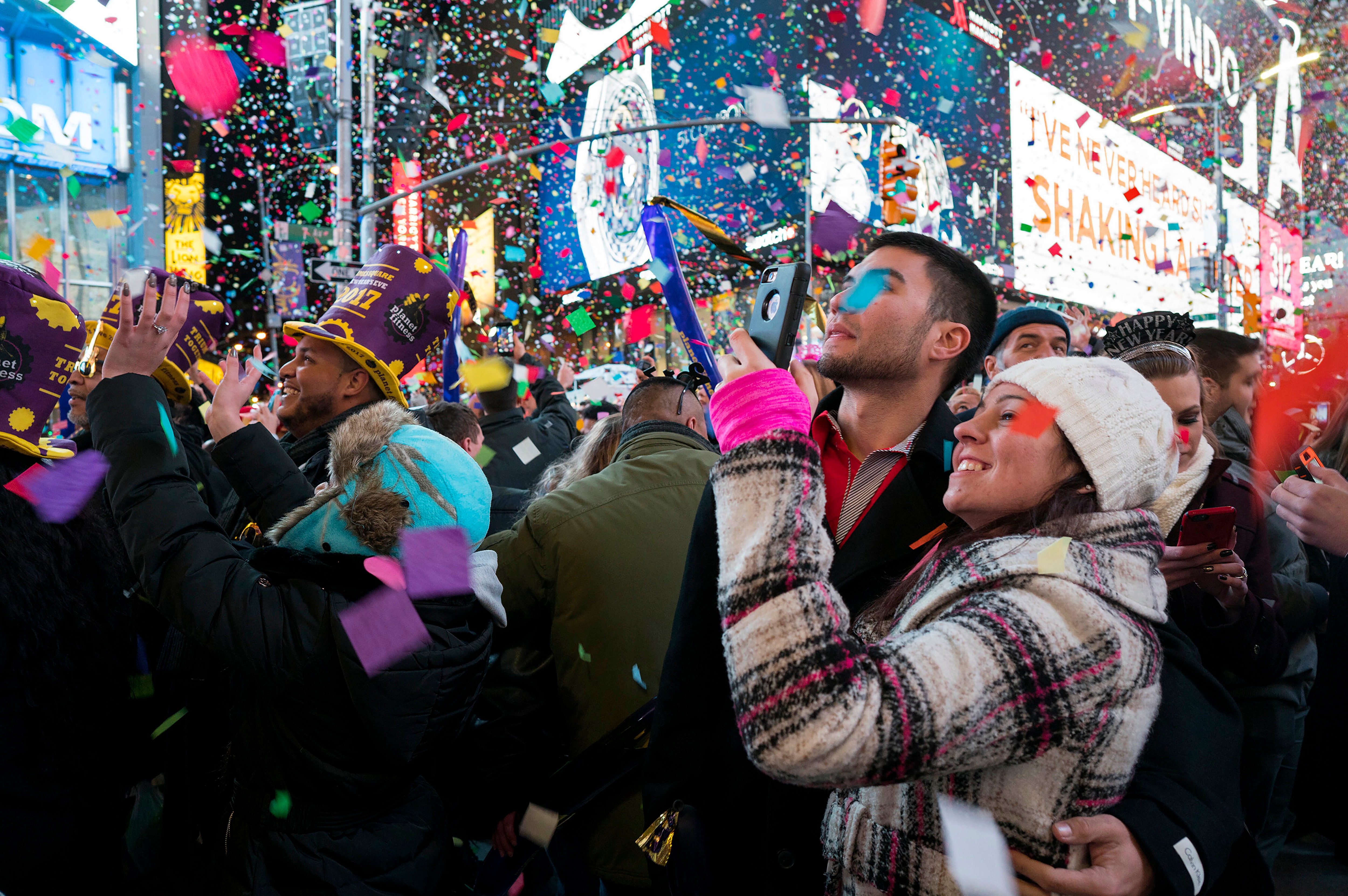 Confetti falls as people celebrate the new year in New York's Times Square in 2017.&nbsp; (AP)