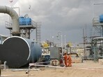 Cairn India employees work at a storage facility for crude oil at Mangala oil field at Barmer(HT File)