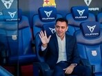 FC Barcelona's new coach Xavi Hernandez waves during his official presentation at the Camp Nou stadium in Barcelona, Spain, Monday, Nov. 8, 2021.(AP)