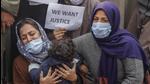 The wife of Mudasir Gul, one of the civilians killed during an encounter with suspected militants at Hyderpora, Srinagar, holds their daughter and demands for justice and the return of her husband's body during a protest in Srinagar on Wednesday. (Waseem Andrabi/ HT) The wife of Mudasir Gul, one of the civilians killed during an encounter with suspected militants at Hyderpora, Srinagar, holds their daughter and demands for justice and the return of her husband's body during a protest in Srinagar on Wednesday. (Waseem Andrabi/ HT)