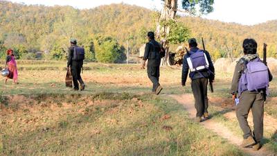 A file photo of CPI Maoist fighters near the Jharkhand-Chhattisgarh border. (HT/File photo) A file photo of CPI Maoist fighters near the Jharkhand-Chhattisgarh border. (HT/File photo)