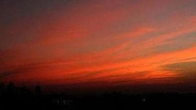 The way the departing sun turns the azure sky into a riot of speckled shades of blue, orange, grey and finally turning it into dark grey, is nothing short of magic. (Representative photo) The way the departing sun turns the azure sky into a riot of speckled shades of blue, orange, grey and finally turning it into dark grey, is nothing short of magic. (Representative photo)