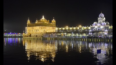 An illuminated Golden Temple on the eve of the birth anniversary of Guru Nanak in Amritsar on Thursday. An illuminated Golden Temple on the eve of the birth anniversary of Guru Nanak in Amritsar on Thursday.