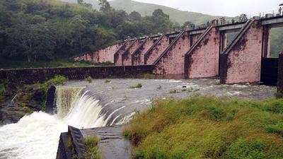 The catchment areas of Idukki Dam received 30 mm rainfall in the last 24 hours and in Mullaperiyar it was 22 mm. The inflow of water doubled in the two dams forcing authorities to ease them immediately. (ANI PHOTO.) The catchment areas of Idukki Dam received 30 mm rainfall in the last 24 hours and in Mullaperiyar it was 22 mm. The inflow of water doubled in the two dams forcing authorities to ease them immediately. (ANI PHOTO.)