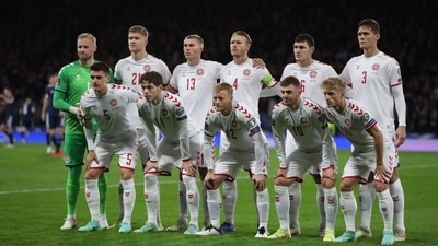 Denmark players pose for a team group photo before the match. (REUTERS)