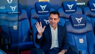 FC Barcelona's new coach Xavi Hernandez waves during his official presentation at the Camp Nou stadium in Barcelona, Spain, Monday, Nov. 8, 2021. (AP) FC Barcelona's new coach Xavi Hernandez waves during his official presentation at the Camp Nou stadium in Barcelona, Spain, Monday, Nov. 8, 2021. (AP)