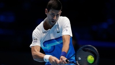 Serbia’s Novak Djokovic in action during his group stage match against Russia’s Andrey Rublev&nbsp; (REUTERS)