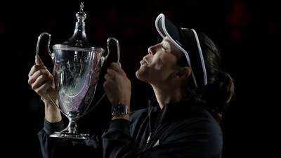 Spain's Garbine Muguruza celebrates with the trophy after winning her final match against Estonia's Anett Kontaveit&nbsp; (Reuters)