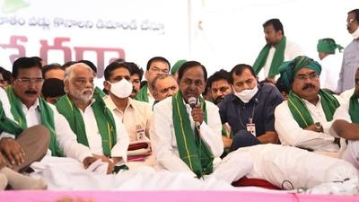 For the first time after taking over as the first chief minister of Telangana seven years ago, KCR sat on a dharna at Indira Park along with his party functionaries on Thursday. (HT PHOTO.) For the first time after taking over as the first chief minister of Telangana seven years ago, KCR sat on a dharna at Indira Park along with his party functionaries on Thursday. (HT PHOTO.)