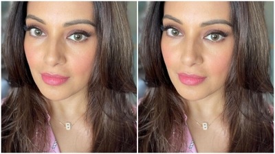 Bipasha left her tresses open with a middle part as she posed for the pictures. (Instagram/@bipashabasu)