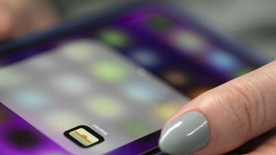 A person uses an iPhone in New York. Apple will soon roll out a DIY repair feature for some of its iPhone models and Mac models. (AP/File) A person uses an iPhone in New York. Apple will soon roll out a DIY repair feature for some of its iPhone models and Mac models. (AP/File)
