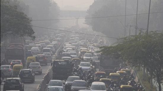 Commuters drive amid morning haze and smog in New Delhi on Wednesday. The Capital’s air quality was ‘very poor’ on Thursday as well. (AP)