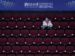 The US president is under pressure at home to speak out on China’s human rights abuses. In picture - A staff member watching an ice hockey match, part of a 2022 Beijing Winter Olympic Games test event, at the Wukesong Sports Centre in Beijing.(AFP) The US president is under pressure at home to speak out on China’s human rights abuses. In picture - A staff member watching an ice hockey match, part of a 2022 Beijing Winter Olympic Games test event, at the Wukesong Sports Centre in Beijing.(AFP)