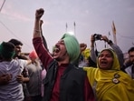 Farmers at New Delhi's Singh border celebrate after Centre announced that it would repeal the three farm laws.(HT Photo) Farmers at New Delhi's Singh border celebrate after Centre announced that it would repeal the three farm laws.(HT Photo)