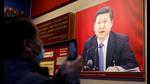 A man holds a mobile phone in front of an image of Chinese President Xi Jinping displayed at the Museum of the Communist Party of China, Beijing, China (REUTERS) A man holds a mobile phone in front of an image of Chinese President Xi Jinping displayed at the Museum of the Communist Party of China, Beijing, China (REUTERS)