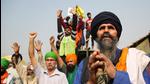 Farmers celebrate at Delhi’s Singhu border protest site after PM Narendra Modi announced that the three contentious farm laws will be repealed. (Sanchit Khanna/ Hindustan Times) Farmers celebrate at Delhi’s Singhu border protest site after PM Narendra Modi announced that the three contentious farm laws will be repealed. (Sanchit Khanna/ Hindustan Times)