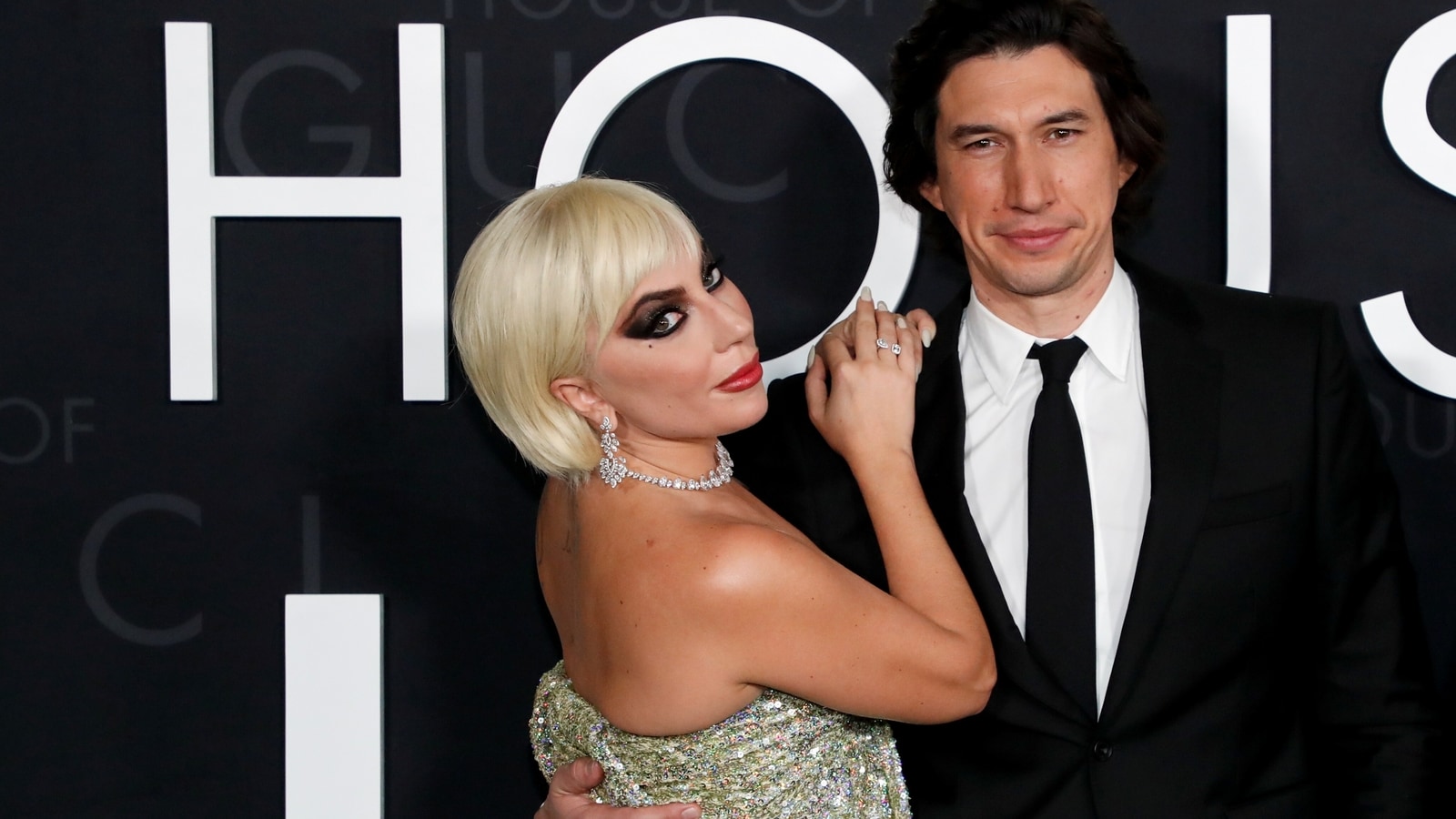 Lady Gaga with Adam Driver sparkles in silver Valentino dress at House Of Gucci  premiere | Hindustan Times