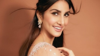 Accessorising the cut sleeves Anarkali kurti with a tiny bindi, a statement gold bangle in each hand and a pair of drop diamond earrings, Vaani amplified the glam quotient with a dab of pink lip gloss, rosy blushed and highlighted cheeks, kohl-lined eyes with black eyeliner streaks, mascara-laden eyelashes and filled-in eyebrows. (Instagram/_vaanikapoor_) Accessorising the cut sleeves Anarkali kurti with a tiny bindi, a statement gold bangle in each hand and a pair of drop diamond earrings, Vaani amplified the glam quotient with a dab of pink lip gloss, rosy blushed and highlighted cheeks, kohl-lined eyes with black eyeliner streaks, mascara-laden eyelashes and filled-in eyebrows. (Instagram/_vaanikapoor_)