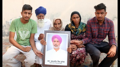 The family members of Kamaljit Singh Bhullar, who died during a dharna at the Tikri border, at Mandi Kalan village in Bathinda district. The family members of Kamaljit Singh Bhullar, who died during a dharna at the Tikri border, at Mandi Kalan village in Bathinda district.