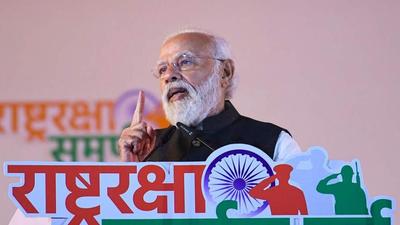 Prime Minister Narendra Modi at the Rashtra Raksha Samarpan Parv in Jhansi. (PTI PHOTO) Prime Minister Narendra Modi at the Rashtra Raksha Samarpan Parv in Jhansi. (PTI PHOTO)