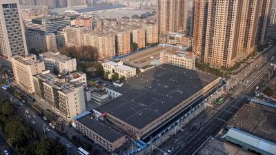 A general view shows the Huanan Wholesale Seafood Market, where the first cluster of cases of Covid-19 emerged, in Wuhan, Hubei province, China. (REUTERS) A general view shows the Huanan Wholesale Seafood Market, where the first cluster of cases of Covid-19 emerged, in Wuhan, Hubei province, China. (REUTERS)
