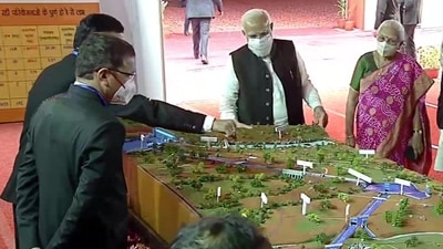 Prime Minister Modi inspecting the models of various developmental projects that are to be inaugurated in Mahoba. (Photo via ANI) Prime Minister Modi inspecting the models of various developmental projects that are to be inaugurated in Mahoba. (Photo via ANI)