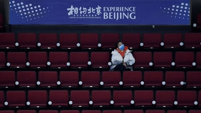 The US president is under pressure at home to speak out on China’s human rights abuses. In picture - A staff member watching an ice hockey match, part of a 2022 Beijing Winter Olympic Games test event, at the Wukesong Sports Centre in Beijing. (AFP) The US president is under pressure at home to speak out on China’s human rights abuses. In picture - A staff member watching an ice hockey match, part of a 2022 Beijing Winter Olympic Games test event, at the Wukesong Sports Centre in Beijing. (AFP)