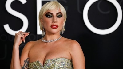 Lady Gaga completed her House Of Gucci premiere attire with her short blonde tresses parted on the side and left open. (REUTERS)