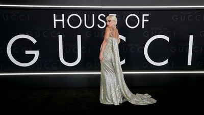 The sequinned dress also came with a long floor-sweeping train that added a regal touch to the Grammy-Award winning singer's look. She accessorised the ensemble with a diamond choker necklace and matching delicate earrings. (REUTERS)