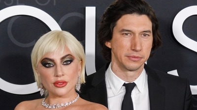While Gaga looked incredible in her sequinned gown, Adam Driver was dapper as ever in a chic black suit. He chose a tailored notch lapel jacket with a crisp white shirt, black tie and pants. (Willy Sanjuan/Invision/AP) While Gaga looked incredible in her sequinned gown, Adam Driver was dapper as ever in a chic black suit. He chose a tailored notch lapel jacket with a crisp white shirt, black tie and pants. (Willy Sanjuan/Invision/AP)