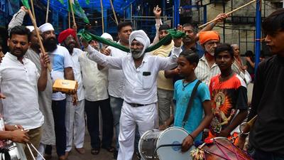 Congress activists celebrate the repeal of three contentious farm laws by Central government. Farmers’ outfits and political parties in the state welcomed Prime Minister Narendra Modi’s announcement to withdraw three farm laws and described it as a victory for the farmers. (HT PHOTO) Congress activists celebrate the repeal of three contentious farm laws by Central government. Farmers’ outfits and political parties in the state welcomed Prime Minister Narendra Modi’s announcement to withdraw three farm laws and described it as a victory for the farmers. (HT PHOTO)