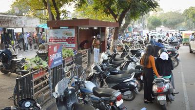 In addition to street vendors, Sector 15 residents complain about the mushrooming of PG accommodations, which particularly create parking problems. (Gurtej Singh/HT) In addition to street vendors, Sector 15 residents complain about the mushrooming of PG accommodations, which particularly create parking problems. (Gurtej Singh/HT)