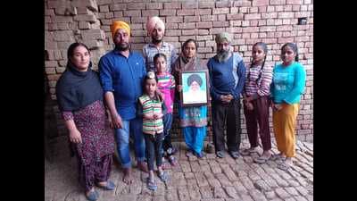 The family of Saudagar Singh who died of heart attack at the protest site at Singhu border, at Kaler Ghuman village in Amritsar district on Friday. The family of Saudagar Singh who died of heart attack at the protest site at Singhu border, at Kaler Ghuman village in Amritsar district on Friday.