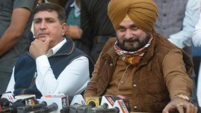 Punjab Congress chief Navjot Singh Sidhu said in Sultanpur Lodhi on Friday that two major demands of Punjab were met this week. First, the Kartarpur Corridor was reopened and second, the PM has announced the repeal of the farm laws. (HT file photo) Punjab Congress chief Navjot Singh Sidhu said in Sultanpur Lodhi on Friday that two major demands of Punjab were met this week. First, the Kartarpur Corridor was reopened and second, the PM has announced the repeal of the farm laws. (HT file photo)