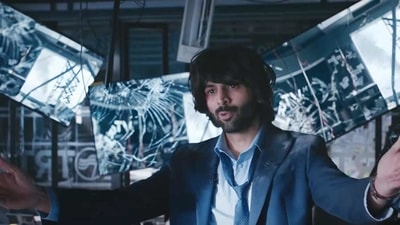Kartik Aaryan plays a TV journalist caught up between humanity and TRPs in Dhamaka. Kartik Aaryan plays a TV journalist caught up between humanity and TRPs in Dhamaka.