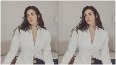 Gabriella styled a midriff-baring white blazer with a pair of black trousers. (Instagram/@gabriellademetriades) Gabriella styled a midriff-baring white blazer with a pair of black trousers. (Instagram/@gabriellademetriades)