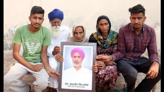 The family members of Kamaljit Singh Bhullar, who died during a dharna at the Tikri border, at Mandi Kalan village in Bathinda district. The family members of Kamaljit Singh Bhullar, who died during a dharna at the Tikri border, at Mandi Kalan village in Bathinda district.