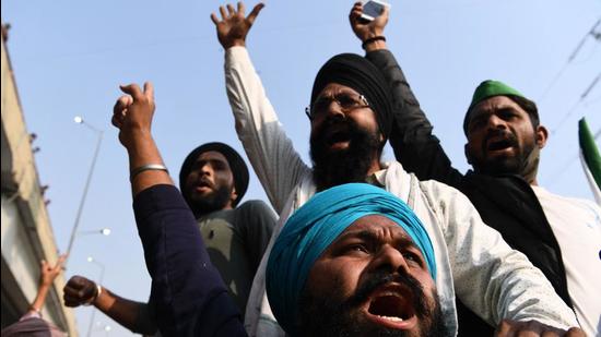 File photo of farmers protesting against the farm laws at the Delhi-Uttar Pradesh border in Ghazipur, in November last year. The Centre repealed the laws on Friday. (AFP/File)