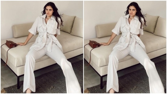 Gabriella gave a twist to formal fashion in a white shirt with a tie-up detail in front. She paired it with a pair of white trousers.(Instagram/@gabriellademetriades)