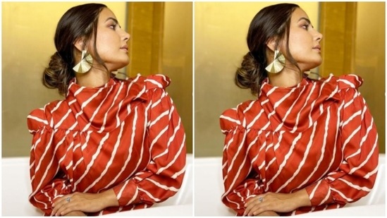 Hina accessorised her look with classic black stilettoes and gold earrings.(Instagram/@realhinakhan)