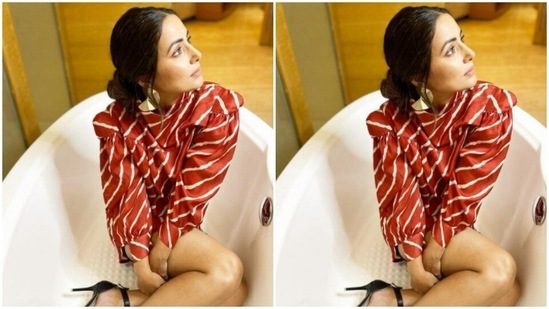 Hina wore her hair into a messy bun as she posed for the cameras.(Instagram/@realhinakhan)