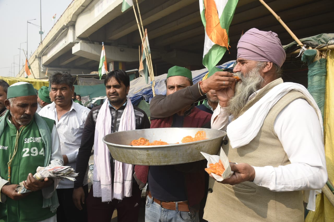 A wave of happiness among the farmers about the cancellation of three agricultural laws of Prime Minister Narendra Modi at Delhi-UP border. (HT Photo/Sakib Ali) A wave of happiness among the farmers about the cancellation of three agricultural laws of Prime Minister Narendra Modi at Delhi-UP border. (HT Photo/Sakib Ali)