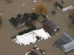 The Royal Canadian Mounted Police confirmed Saturday that the bodies of three men listed earlier as missing have now been found near Duffey Lake, northeast of Vancouver. In picture - Floodwaters surround homes and farms in Abbotsford, British Columbia. (AFP) The Royal Canadian Mounted Police confirmed Saturday that the bodies of three men listed earlier as missing have now been found near Duffey Lake, northeast of Vancouver. In picture - Floodwaters surround homes and farms in Abbotsford, British Columbia. (AFP)