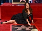 Salma Hayek poses with the new star she was honoured with on the Hollywood Walk of Fame.(Jordan Strauss/Invision/AP) Salma Hayek poses with the new star she was honoured with on the Hollywood Walk of Fame.(Jordan Strauss/Invision/AP)