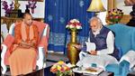 PM Narendra Modi with Uttar Pradesh CM Yogi Adityanath during a meeting at Raj Bhavan in Lucknow on Saturday. (PTI) PM Narendra Modi with Uttar Pradesh CM Yogi Adityanath during a meeting at Raj Bhavan in Lucknow on Saturday. (PTI)