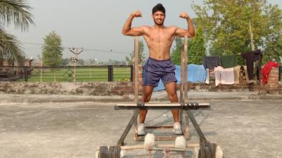 Kuwar Amritbir Singh, who grew up in Umarwala, a village in Gurdaspur district, says he was always fascinated by the legendary body builders and wrestlers of the state. (HT Photo)